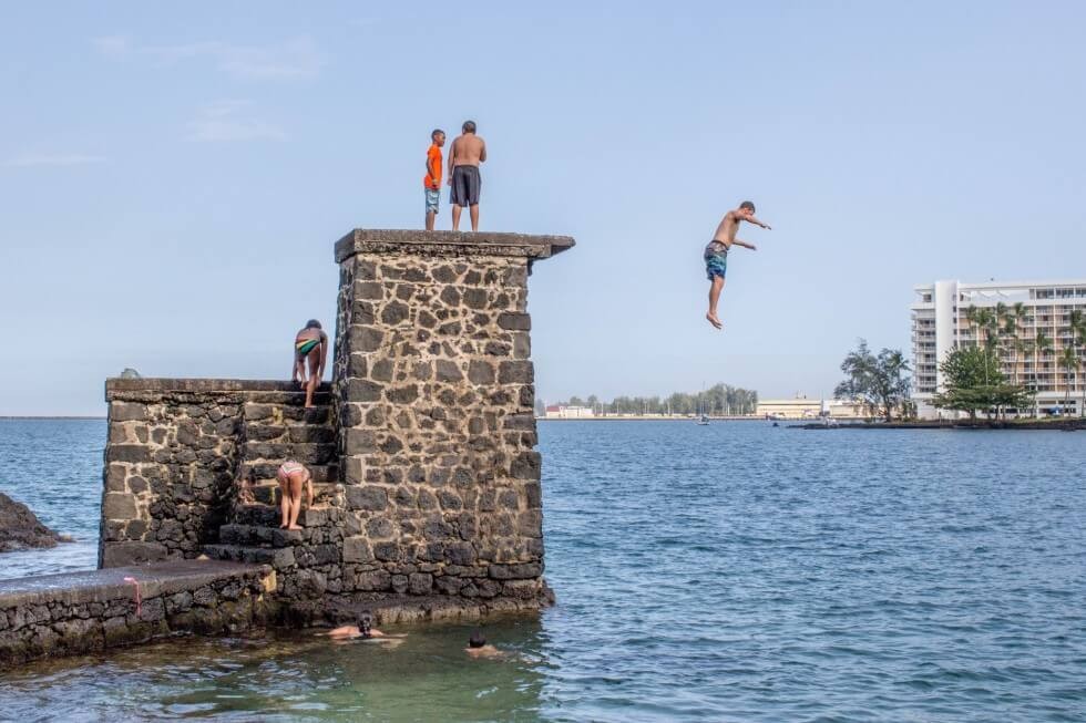 Tom leaping from the tower on Coconut Island Hilo Hawaii