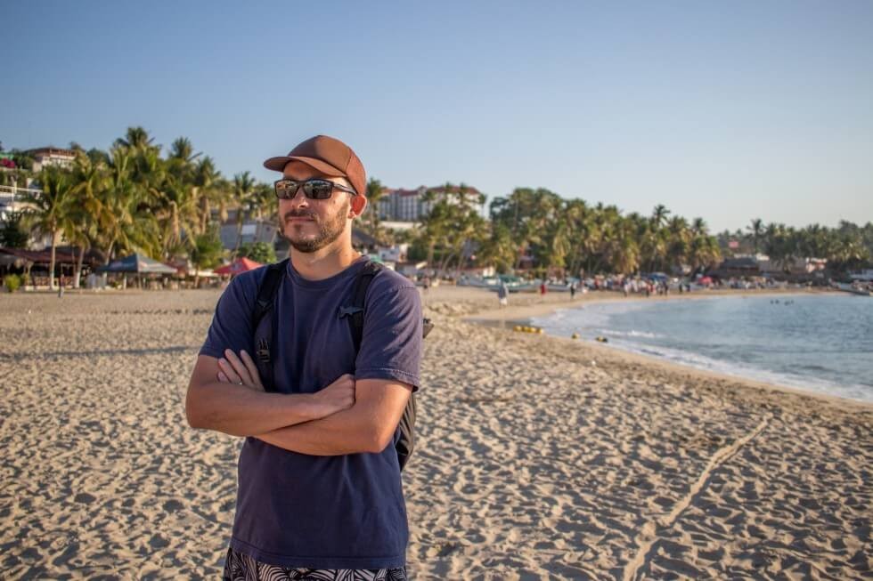 Tom waiting for our boat trip in Puerto Escondido Mexico
