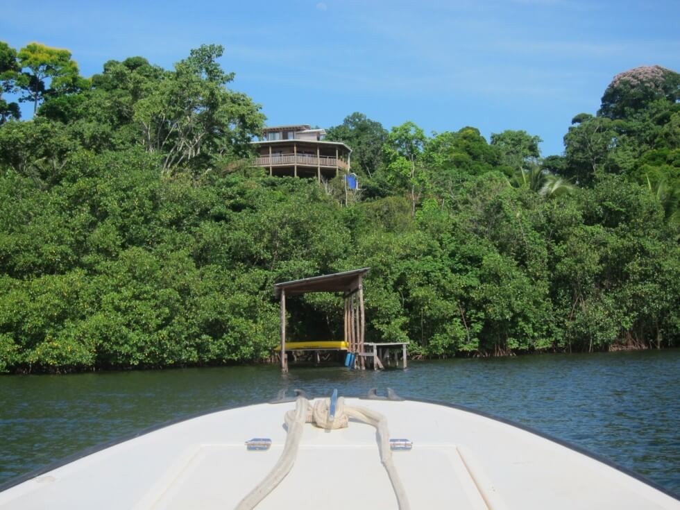 39 - Bocas motor boat and house